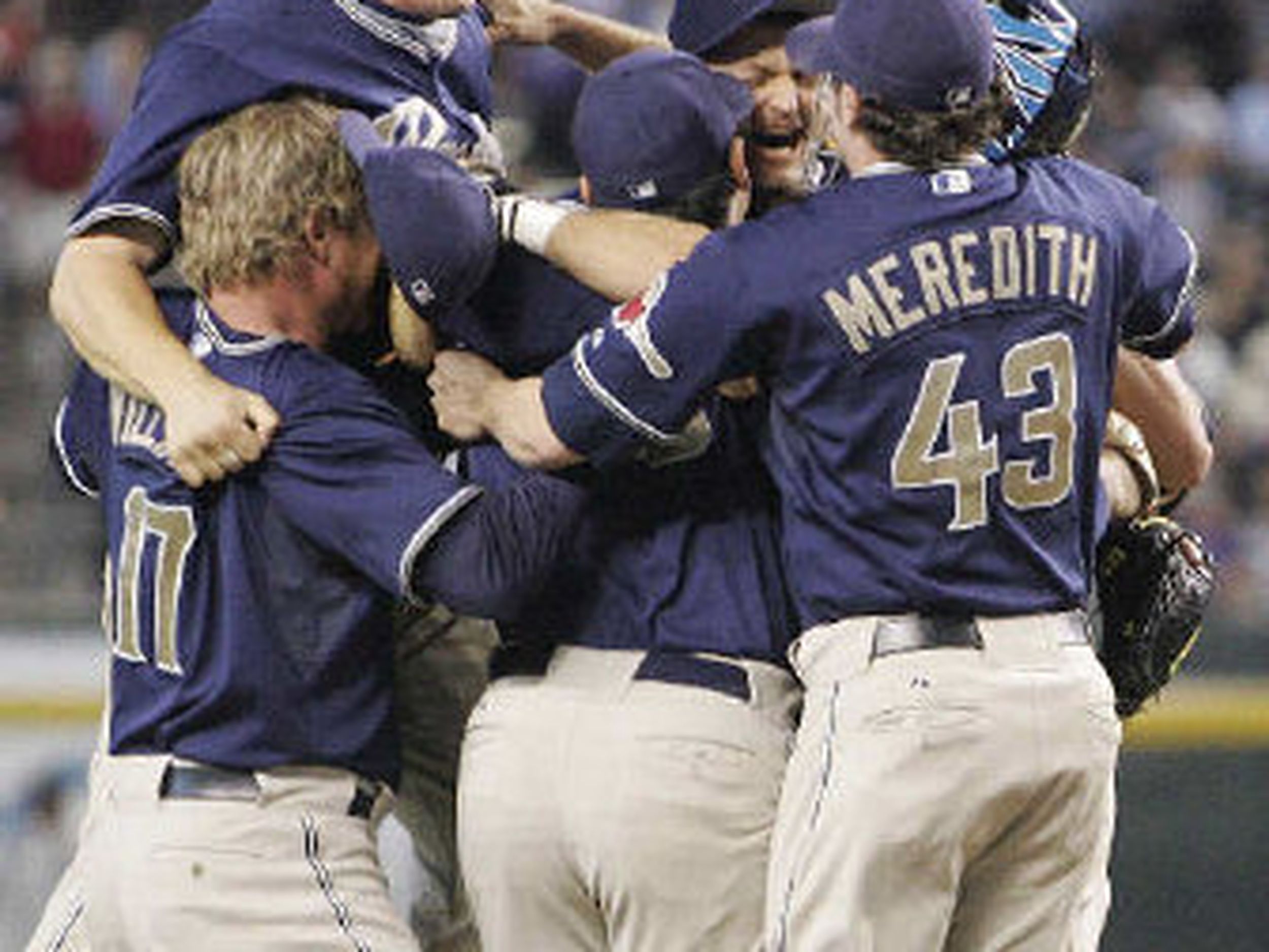 San Diego Padres party in clubhouse after clinching playoff spot