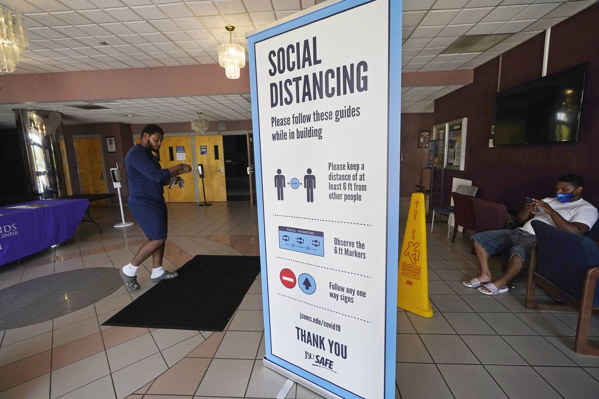 Social distancing as well as face covering is recommended at the COVID-19 vaccination site on July 27 in the Rose E. McCoy Auditorium on the Jackson State University campus in Jackson, Miss. (Rogelio V. Solis)
