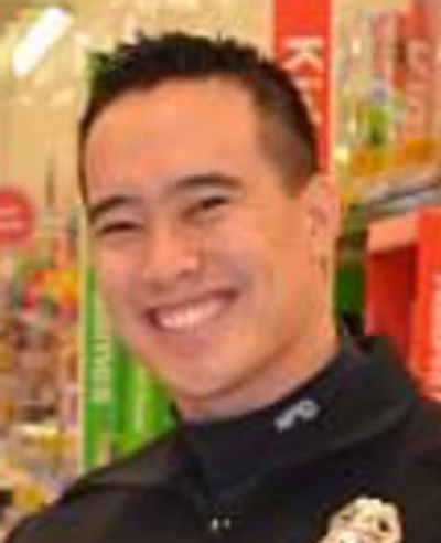 Officer John Yen, 25, was arrested on a first-degree armed burglary charge in the 1100 block of East 11th Avenue after police responded to a witness report shortly after 9 p.m. (Courtesy Photo / The Spokesman-Review)