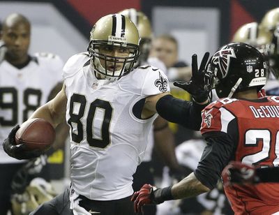 Saints tight end Jimmy Graham caught five passes for 100 yards and a touchdown against Atlanta. (Associated Press)