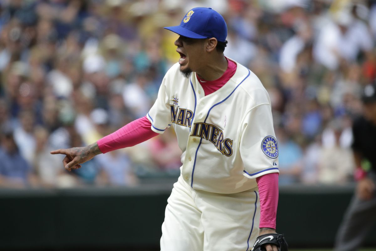 Mariners starter Felix Hernandez shouts after striking out Oakland’s Eric Sogard to end the seventh inning and Hernandez’s day. (Associated Press)