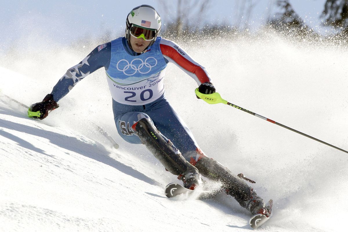 Bode Miller of the United States races downhill on his way to win the men’s super-combined Sunday at the Vancouver 2010 Olympics.  (Associated Press)