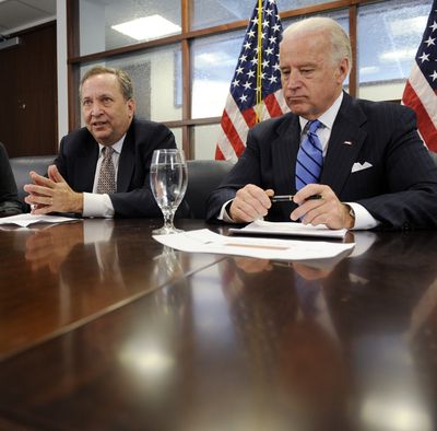 Vice President-elect Joe Biden, right, listens as President-elect Barack Obama’s National Economic Council director Lawrence Summers speaks during a meeting Tuesday in Washington.  (Associated Press / The Spokesman-Review)