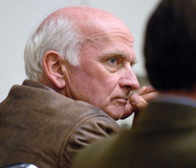 ORG XMIT: MTKAL101 Montana state Sen. Greg D. Barkus, R-Kalispell, left, looks across the courtroom at Flathead Deputy County Attorney Alison Howard during his initial Justice Court appearance in Kalispell Wednesday, Oct. 7, 2009. Barkus has been charged with three felonies for an Aug. 27 boating accident on Flathead Lake. On the right is Barkus' attorney Todd Glazier. Barkus is in a wheelchair recovering from a broken pelvis he suffered in the boat crash. (AP Photo/Daily Inter Lake, Allison Money) (Allison Money / The Spokesman-Review)