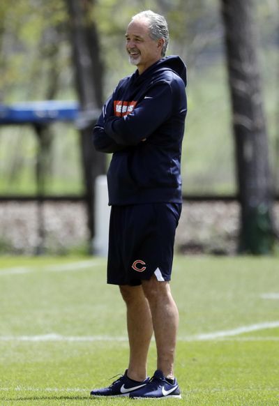 Chicago Bears defensive coordinator Chuck Pagano smiles as he watches his team during NFL football practice in Lake Forest, Ill., Wednesday, May 22, 2019. (Nam Y. Huh / Associated Press)