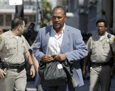 
O.J. Simpson leaves the Clark County Detention Center in Las Vegas on Wednesday after posting $125,000 bail. Associated Press
 (Associated Press / The Spokesman-Review)