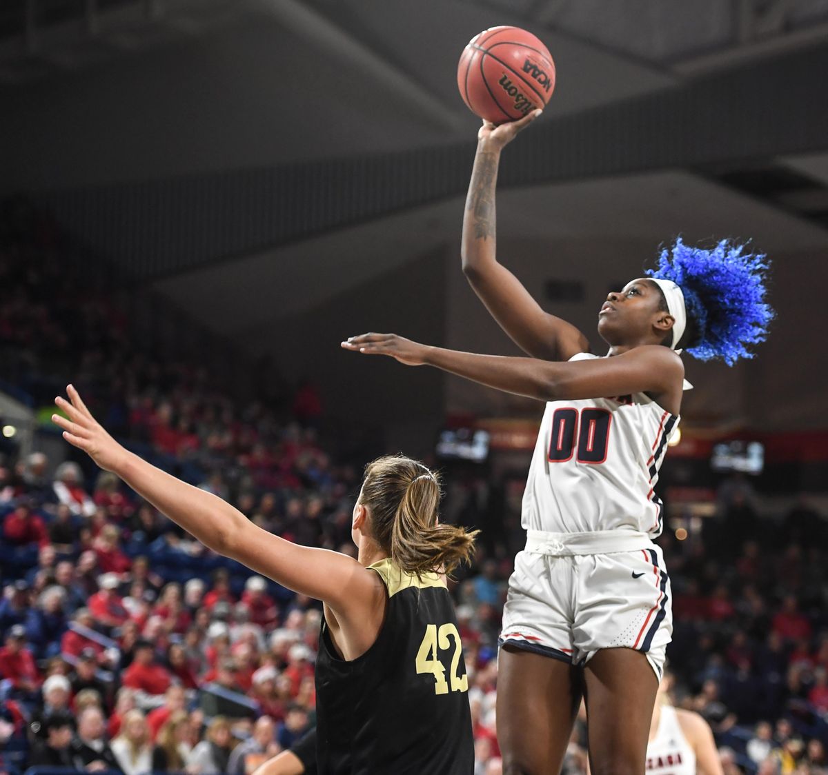 Gonzaga forward Zykera Rice has the soft touch over Idaho forward Natalie Klinker on Dec. 20  in the McCarthey Athletic Center. (Dan Pelle / The Spokesman-Review)