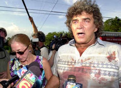 Steve Sipek, right, speaks to the media Tuesday about the killing of his pet tiger, Bobo, in Loxahatchee, Fla., as his fiancée, Lynda Turek, left, looks on. The tiger was shot to death Tuesday after it lunged at a state wildlife officer.
(Associated Press / The Spokesman-Review)