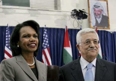 
Palestinian President Mahmoud Abbas stands with U.S. Secretary of State Condoleezza Rice during their joint press conference in the West Bank city of Ramallah on Monday. Associated Press
 (Associated Press / The Spokesman-Review)