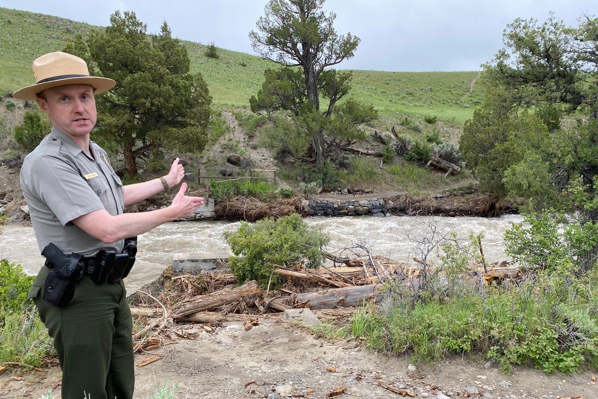 Chris Flesch, Yellowstone National Park’s chief ranger, speaks with reporters on Sunday about the bridge at Rescue Creek Trail that washed away during last week’s flood.  (Brett French/Billings Gazette)