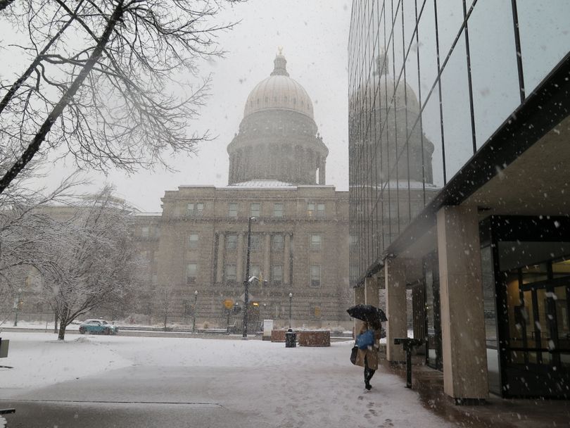 Idaho Capitol, and its reflection in the mirrored J.R. Williams Building, on a snowy Tuesday morning, Feb. 7, 2017 (Betsy Z. Russell)