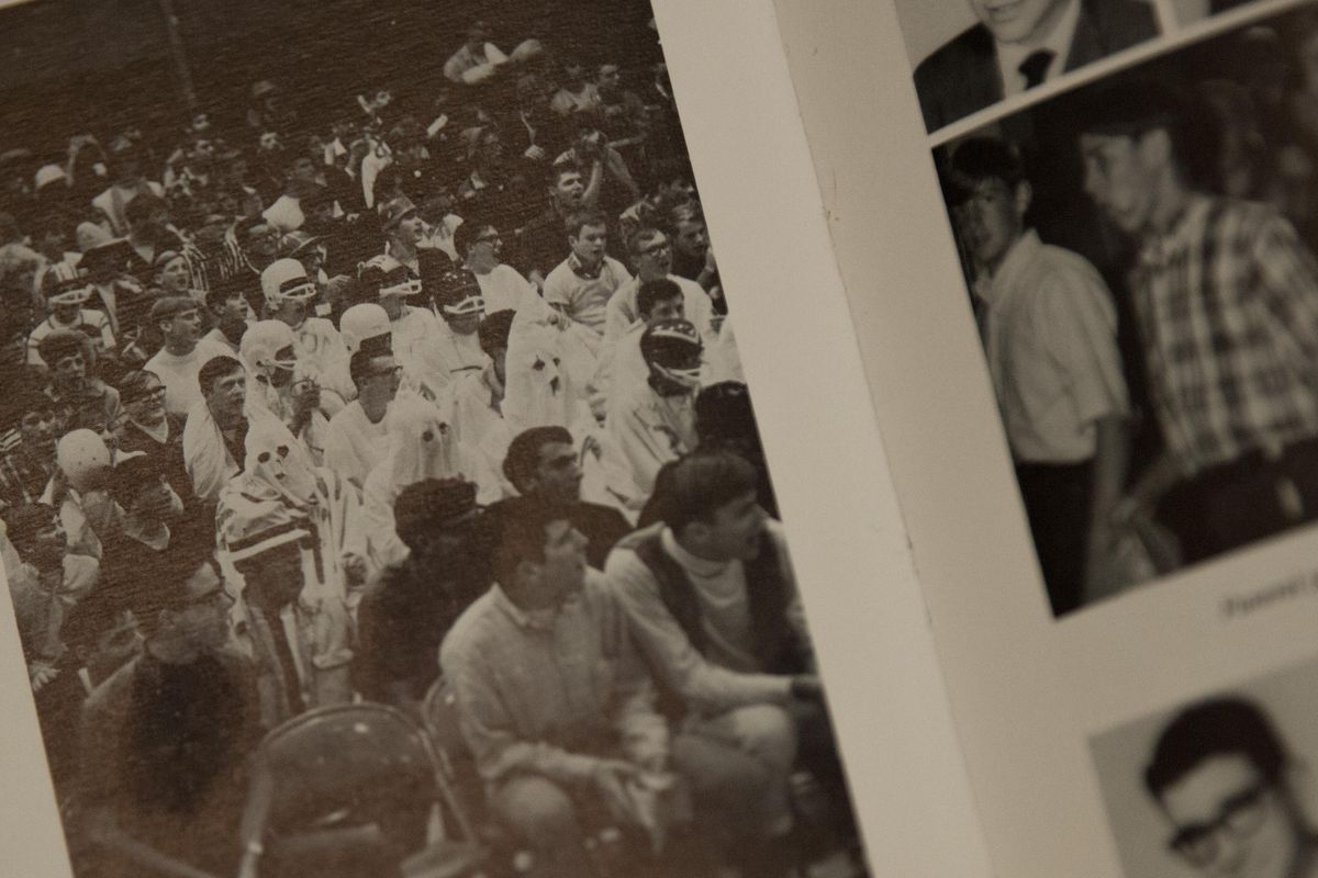 Gonzaga Prep’s 1968 yearbook includes a photo of students wearing Ku Klux Klan robes and hoods during an assembly in the school’s gym. The caption reads, “We want Buckwheat,” an apparent reference to a black character in the TV show “The Little Rascals.” (Tyler Tjomsland / The Spokesman-Review)