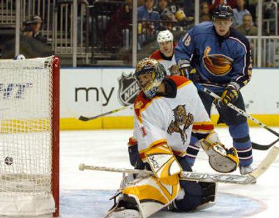
Marian Hossa (18), watching a goal by Thrashers teammate Patrik Stefan, is among the league's top scorers. 
 (Associated Press / The Spokesman-Review)