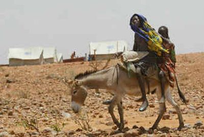 
Sudanese refugees travel by donkey Sunday at a camp in Chad near the Sudan border. About 1 million Sudanese have been displaced. 
 (Associated Press / The Spokesman-Review)