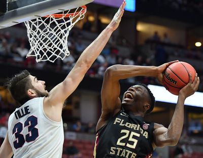 Gonzaga’s Killian Tillie contests a shot by Florida State’s Mfiondu Kabengele during a 2019 NCAA Tournament game. (Tyler Tjomsland / The Spokesman-Review)