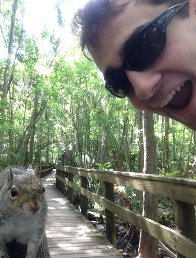 Brian Genest’s selfie of himself and the squirrel. (Associated Press)