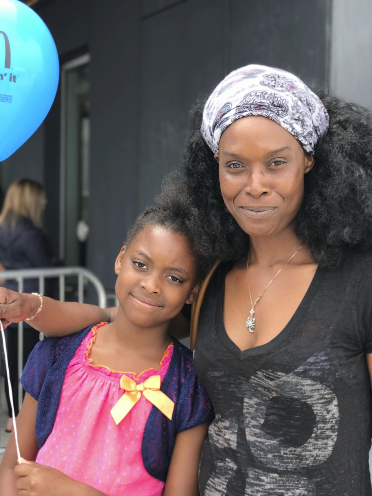 Clarissa Williams, of West Hempstead, N.Y., poses with her daughter Nylah, 8, after seeing one of the final shows of Ringling Brothers and Barnum & Bailey Circus at the Nassau Veterans Memorial Coliseum in Uniondale, N.Y., Saturday, May 20, 2017. Williams is a lifelong circus fan and hopes her daughter will remember the show. (Tamara Lush / Associated Press)