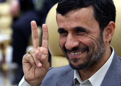 
Iranian President Mahmoud Ahmadinejad attends the closing ceremony of the OPEC  summit  Sunday. Associated Press
 (Associated Press / The Spokesman-Review)