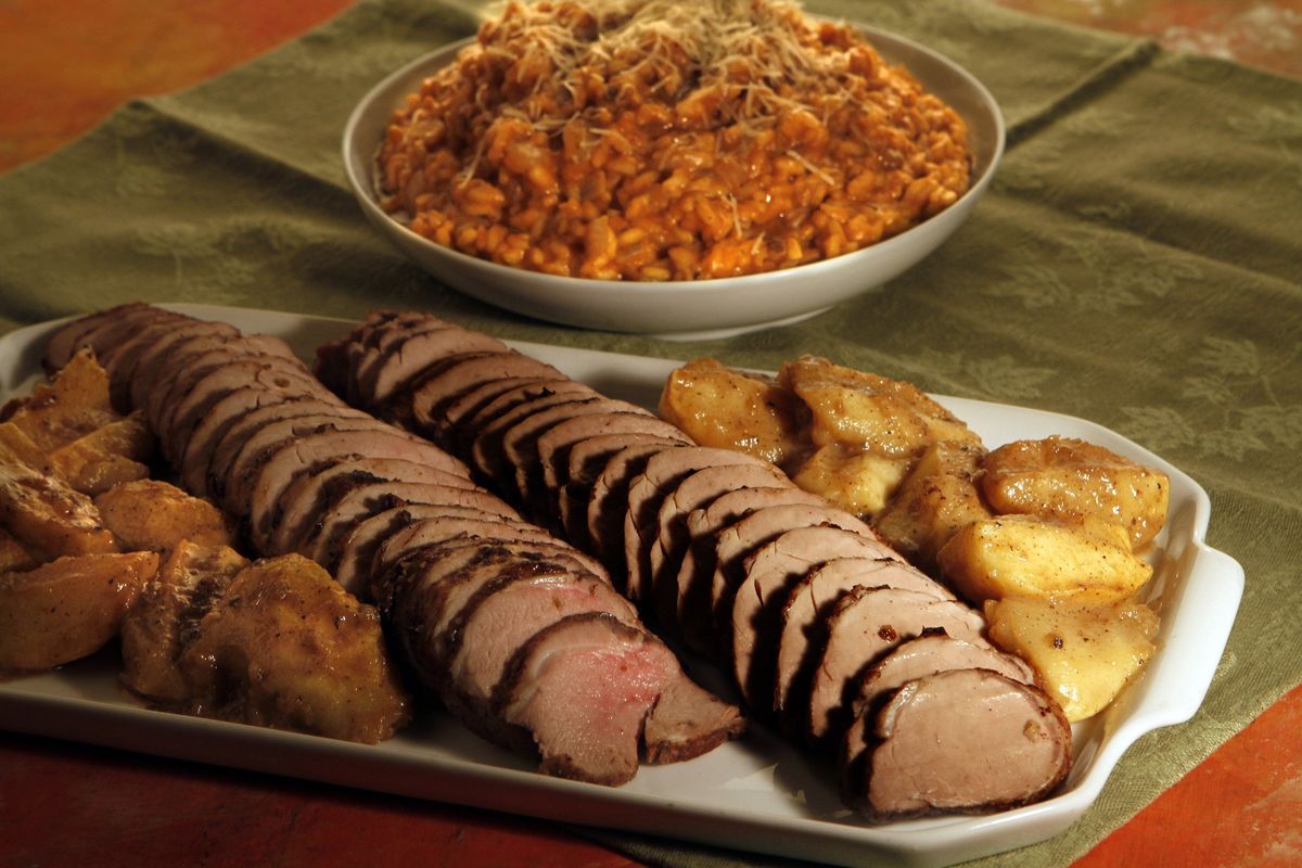 Spiced pork tenderloin with roasted apples and pumpkin risotto is a perfect dinner to embrace autumn.
