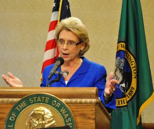 Gov. Chris Gregoire announcing some $2 billion in cuts she may recommend for the special legislative session. (Jim Camden)