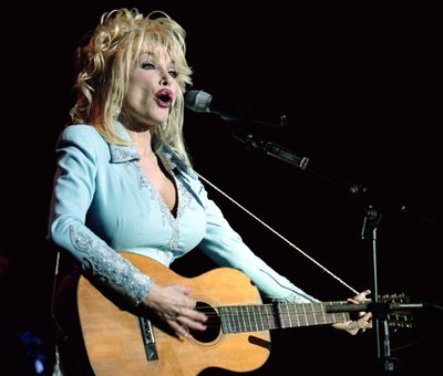 Dolly Parton performs at 9:30 Club in Washington, D.C., in 2002.    (Rich Lipski/The Washington Post)