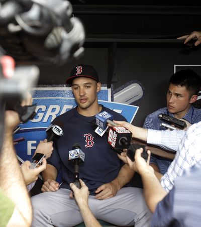 Boston's Grady Sizemore talks to the media about his return to Cleveland before Monday’s game. (Associated Press)