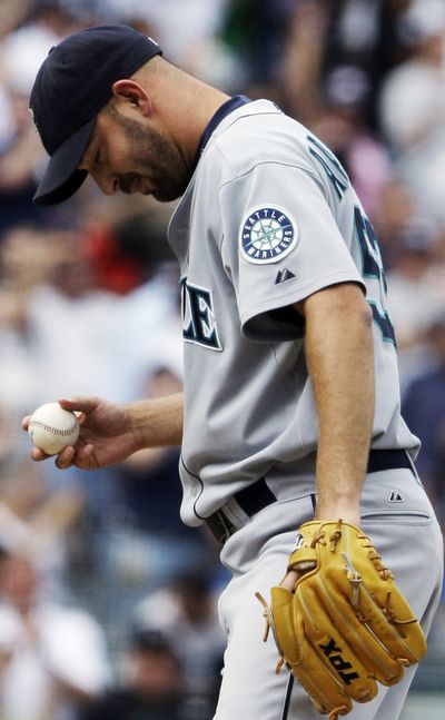 Mariners reliever David Aardsma reacts after Yankees' Alex Rodriguez hit a two-run homer. (Associated Press)