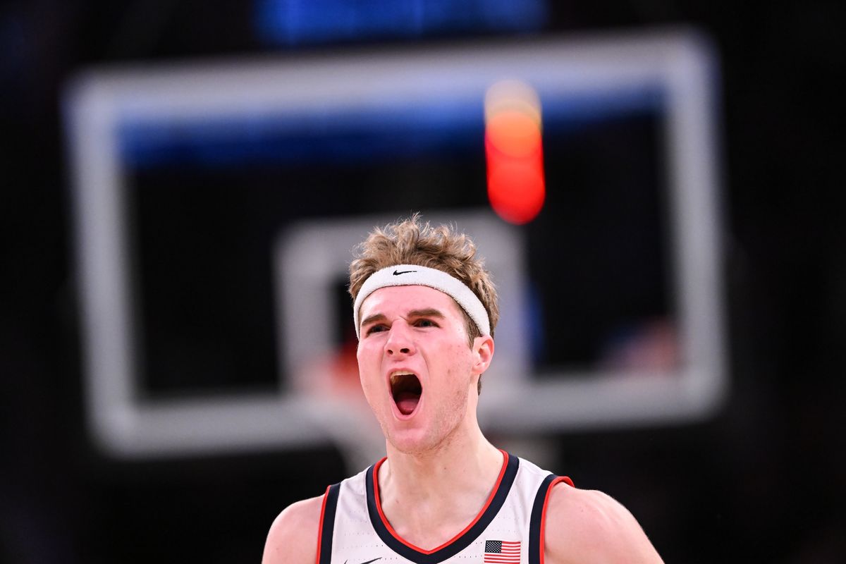 Connecticut Huskies forward Liam McNeeley (30) cheers after the Huskies scored against the Gonzaga Bulldogs during the second half of a college basketball game on Saturday, Dec. 14, 2024, at Madison Square Garden in New York. The Connecticut Huskies won the game 77-71.  (Tyler Tjomsland/The Spokesman-Review)