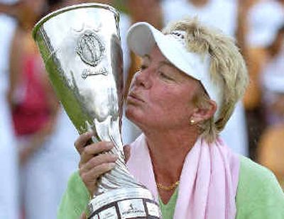 
Wendy Doolan of Australia kisses her trophy after she won the Evian Masters. 
 (Associated Press / The Spokesman-Review)