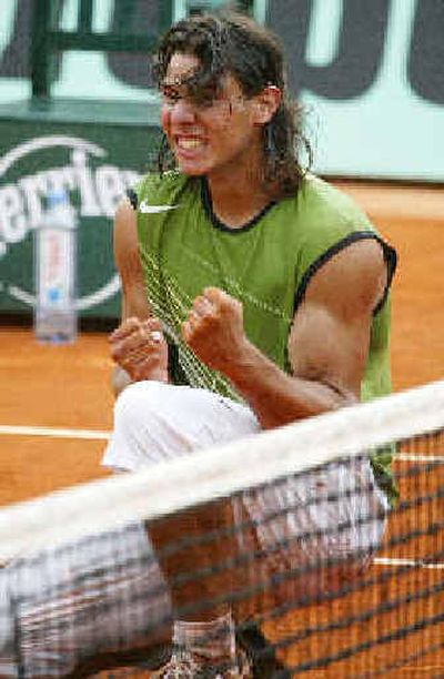 
Spain's Rafael Nadal is pumped up after winning the French Open.
 (Associated Press / The Spokesman-Review)