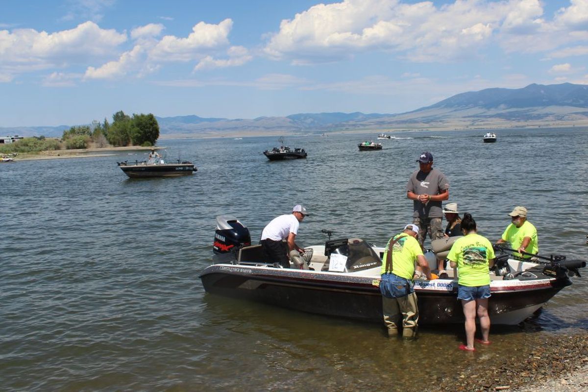 Boaters and anglers at Canyon Ferry Reservoir near Helena, Montana. (Tom Kuglin / Independent-Record via AP)