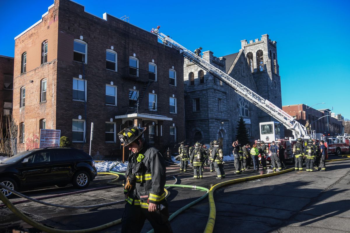 Spokane Fire Department Station 1 Ladder 1 on scene at an apartment blaze, Wednesday, March 20, 2019, at 317 W. Fourth Avenue. (Dan Pelle / The Spokesman-Review)