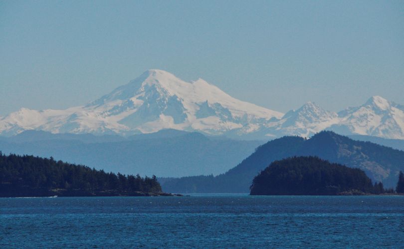 Puget Sound waters provide a haven for boaters below the slopes of Cascades volcanoes such as Mount Baker. (Rich Landers)