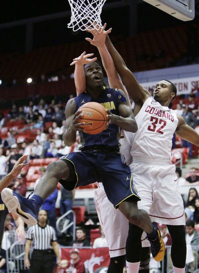 California's Jabari Bird, left, is fouled by Washington State's Que Johnson as he drives to the basket during the second half of Cal’s 80-62 win on Sunday, Feb. 21, 2016, in Pullman, Wash. (Young Kwak / Associated Press)