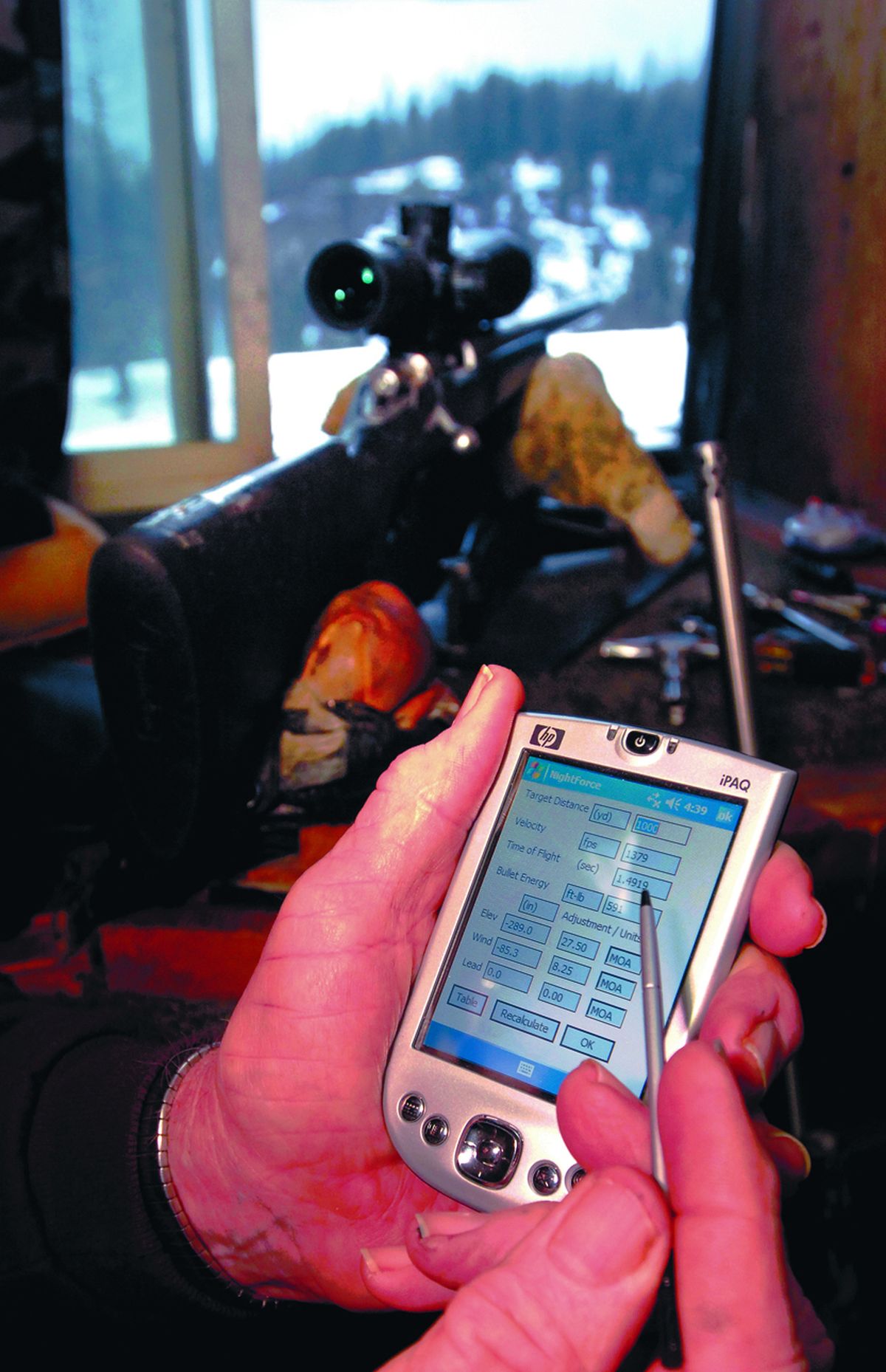 A handheld shooting computer aides calculations for different calibers, loads and ranges for long-range targets.