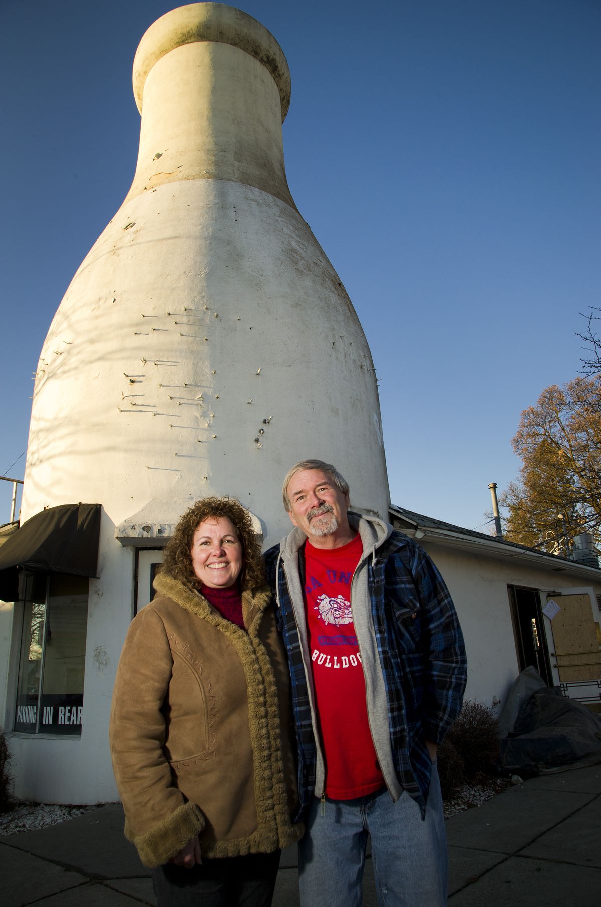 Kristine and Ed Ritchie, owners of the Garland District’s Mary Lou’s Milk Bottle restaurant, are restoring the historic building after a September fire. (Colin Mulvany)