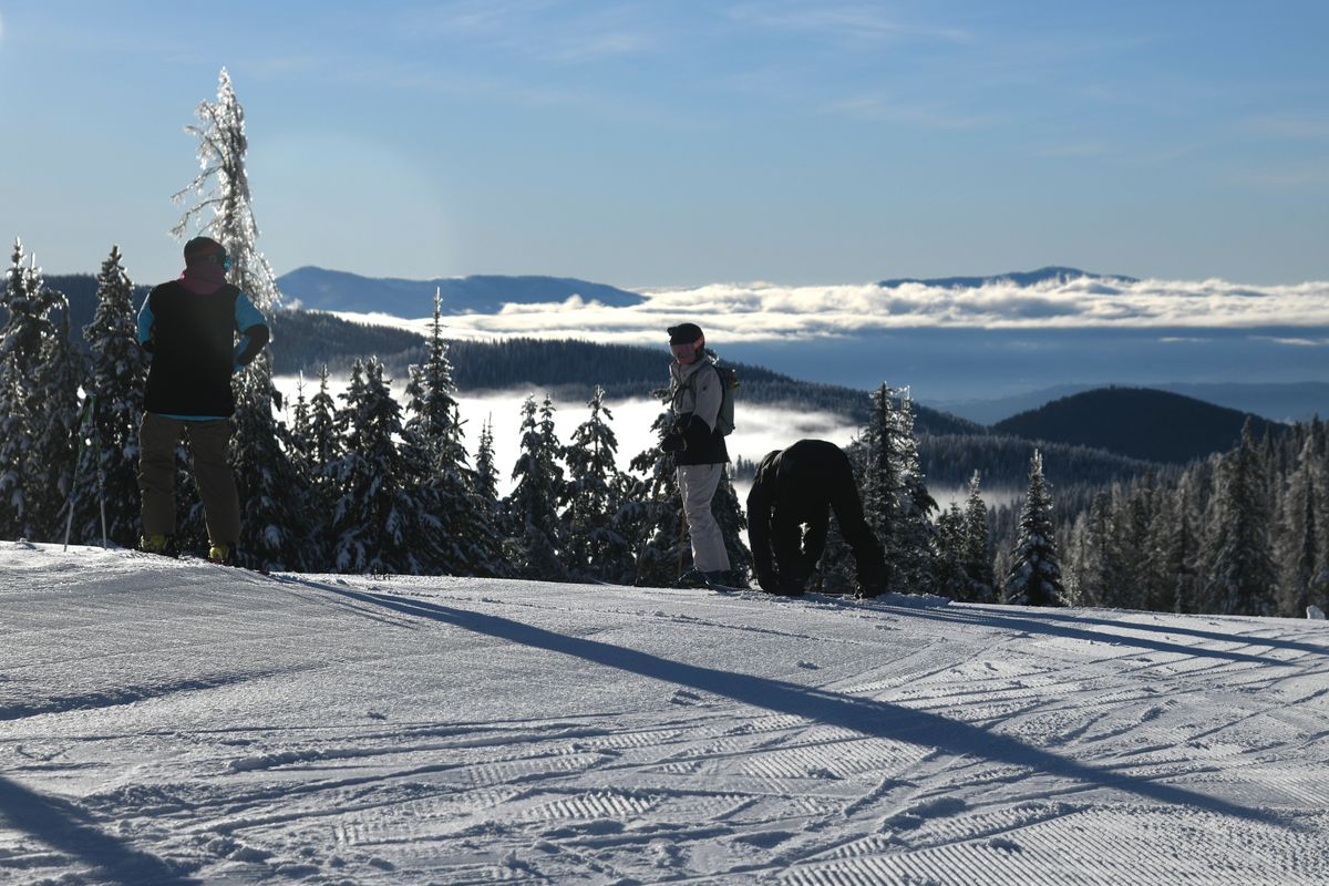 Skiers pause before heading downhill on the first day of the season in 2023 at Mt. Spokane Ski and Snowboard Park.  (Michael Wright/The Spokesman-Review)