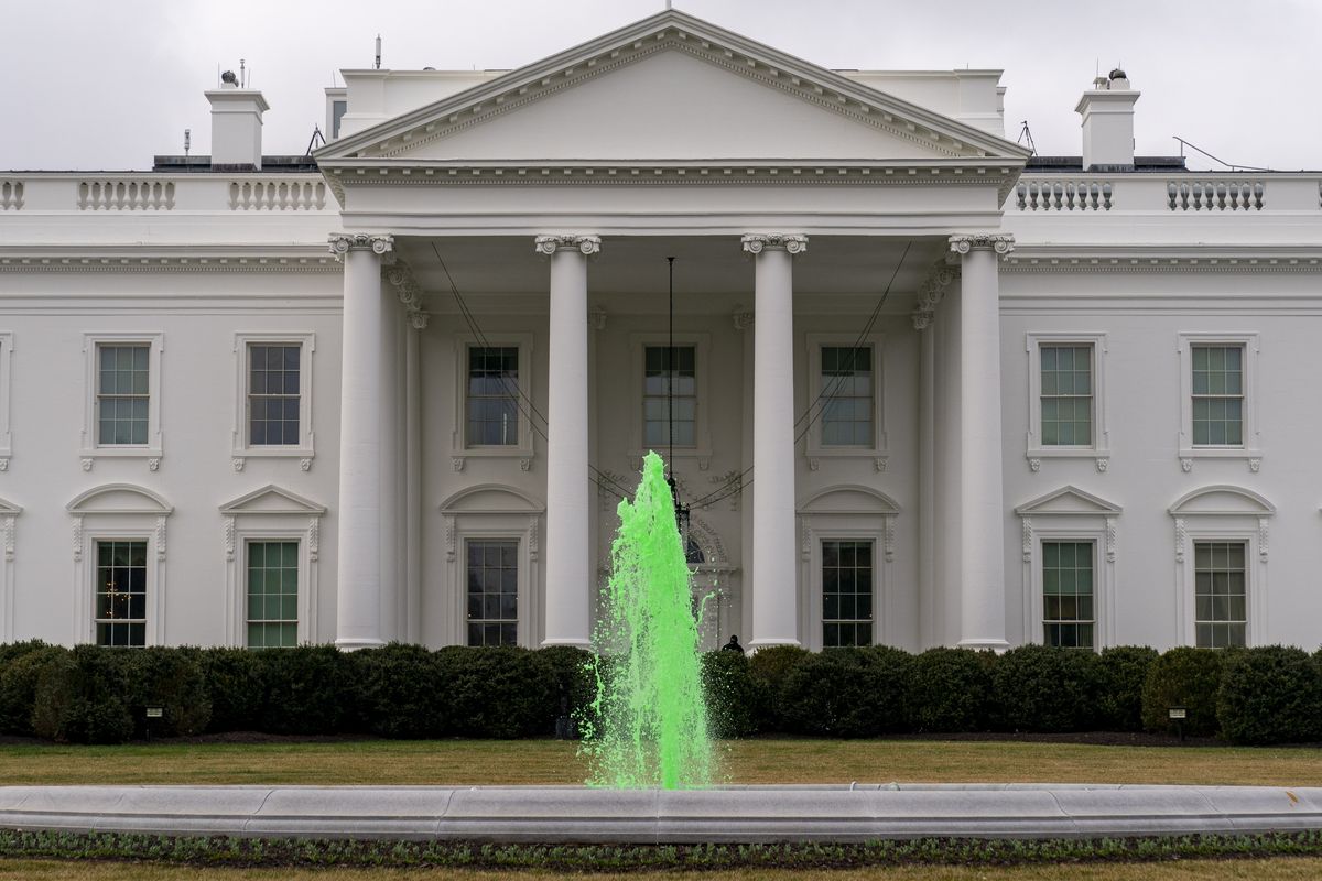 The fountain on the North Lawn of the White House is dyed green for St. Patrick’s Day, Wednesday, March 17, 2021, in Washington.  (Andrew Harnik)