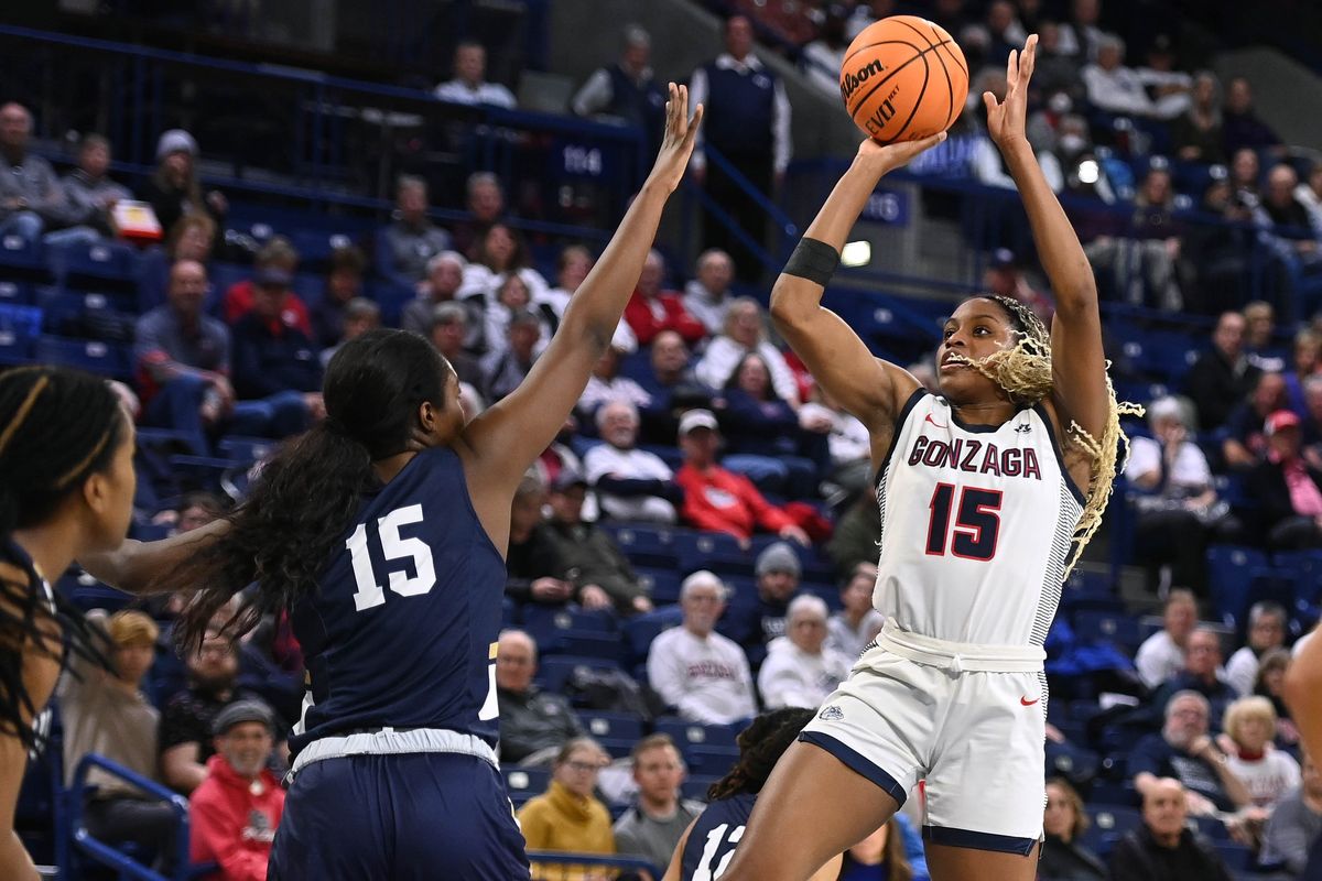 Gonzaga forward Yvonne Ejim, who scored a career-best 32 points, shoots over Queens University of Charlotte center Hawa Balde-Camara during the second half Tuesday.  (COLIN MULVANY/THE SPOKESMAN-REVIEW)