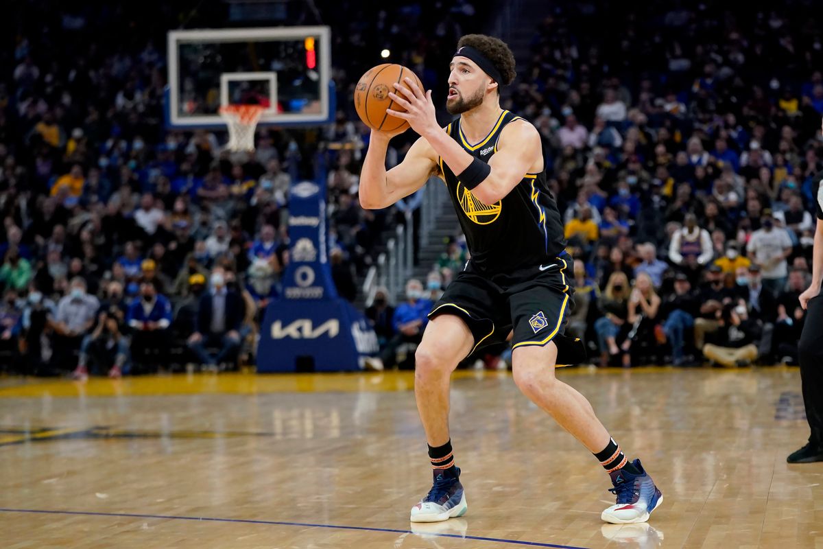 Golden State guard Klay Thompson looks to shoot against Denver in a Feb. 16 game against the Denver Nuggets in San Francisco.  (Associated Press)