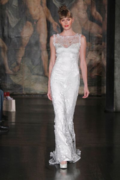 Claire Pettibone’s Sky Between the Branches gown – worn by Priscilla Chan when she wed Mark Zuckerberg – features an illusion neckline, ivory cut-out embroidery with sheer back. Claire Pettibone