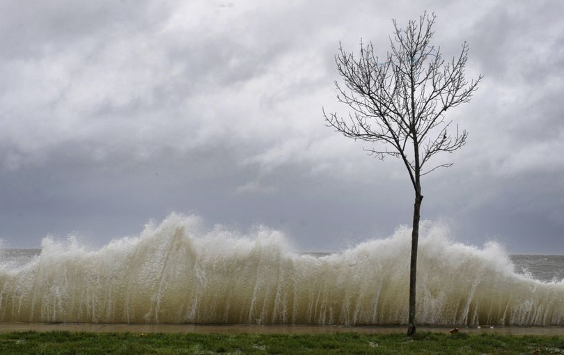 Storm surge hits a small tree as winds from Hurricane Sandy reach Seaside Park in Bridgeport, Conn., Monday, Oct. 29, 2012. Water from Long Island Sound spilled into roadways and towns along the Connecticut shoreline Monday, the first signs of flooding from a storm that threatens to deliver a devastating surge of seawater. (Jessica Hill / Fr125654 Ap)