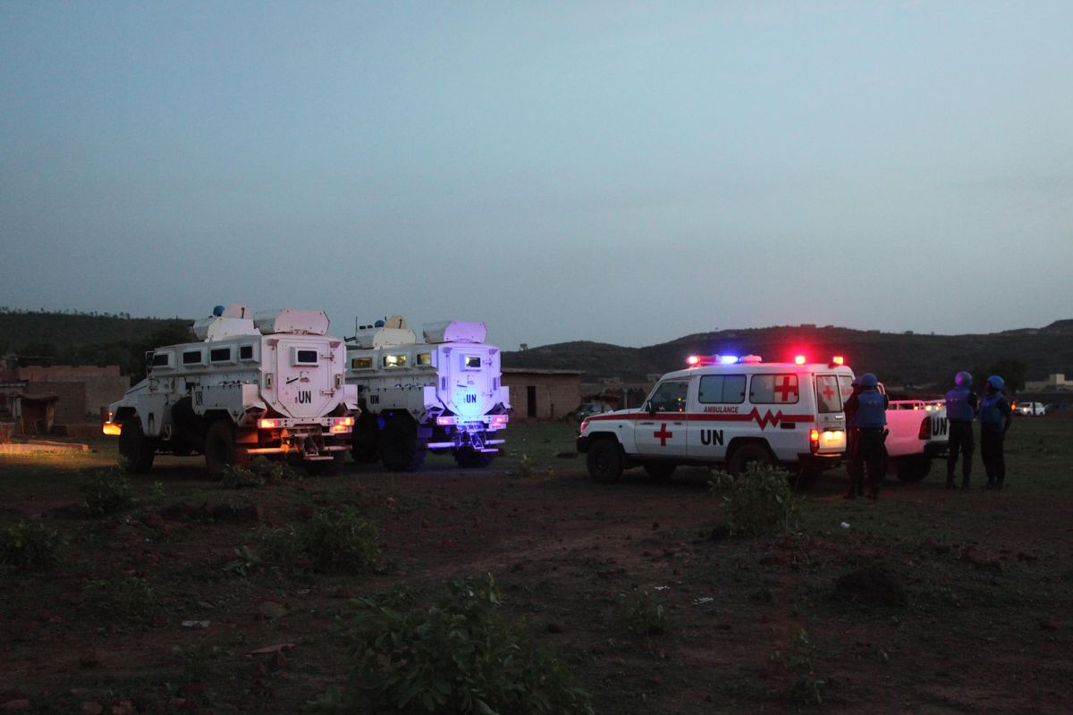 United Nations armored personnel vehicles are stationed with an ambulance outside Campement Kangaba, a tourist resort near Bamako, Mali, Sunday, June 18, 2017. A security official says suspected jihadists have attacked the resort in Mali