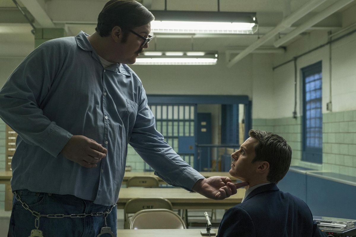 Cameron Britton, left, and Jonathan Groff in a scene from the 10-episode series, "Mindhunter," streaming on Netflix starting Friday. (Merrick Morton / Netflix)