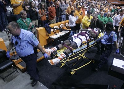 Tennessee’s Wayne Chism left the game on a stretcher Monday. (Associated Press / The Spokesman-Review)