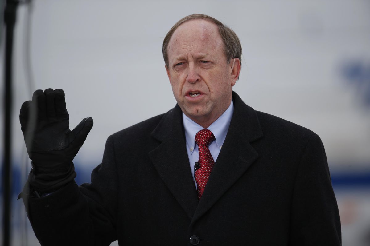 In this Nov. 29, 2015, file photo, Colorado Springs, Colo., Mayor John Suthers talks to a reporter as police investigators gather evidence near the scene of Friday’s shooting at a Planned Parenthood clinic. President Donald Trump is considering nearly a dozen candidates to succeed ousted FBI Director James Comey, choosing from a group that includes several lawmakers, attorneys and law enforcement officials. (David Zalubowski / Associated Press)