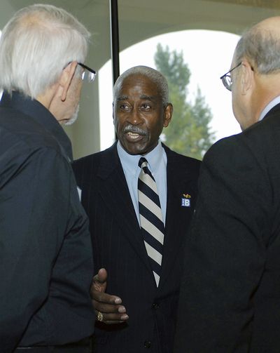 Associated Press Willie Evans, center, greets former Buffalo teammates before this year’s alumni dinner. (Associated Press / The Spokesman-Review)