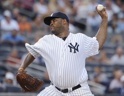 CC Sabathia pitched a three-hitter and struck out 10 Friday as the New York Yankees ended Seattle's seven-game winning streak. (Associated Press)