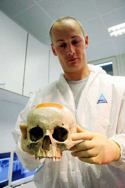 
Forensic doctor Walther Parson holds the alleged skull of Wolfgang Amadeus Mozart in this undated photo released by Austrian state television ORF. 
 (Associated Press / The Spokesman-Review)