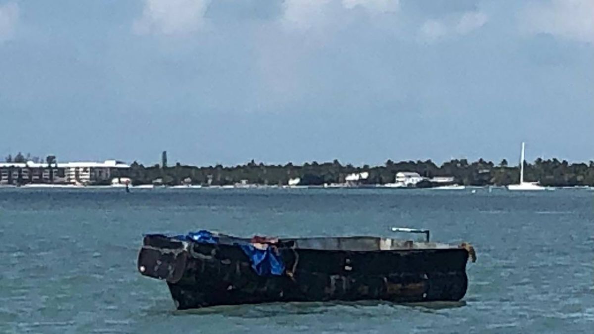 A migrant boat floats offshore of Windley Key in the Florida Keys on Thursday, March 10, 2022. Border Patrol officials say 10 people arrived on the vessel from Cuba.    ( U.S. Border Patrol/TNS)